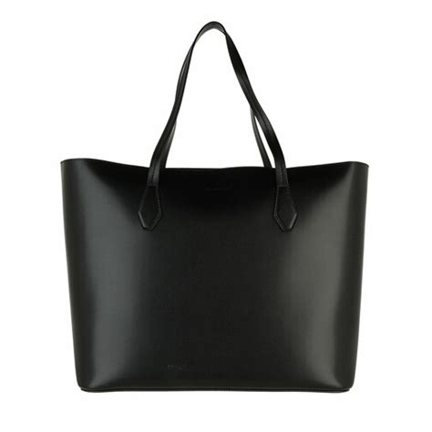 givenchy logo embossed tote bag.